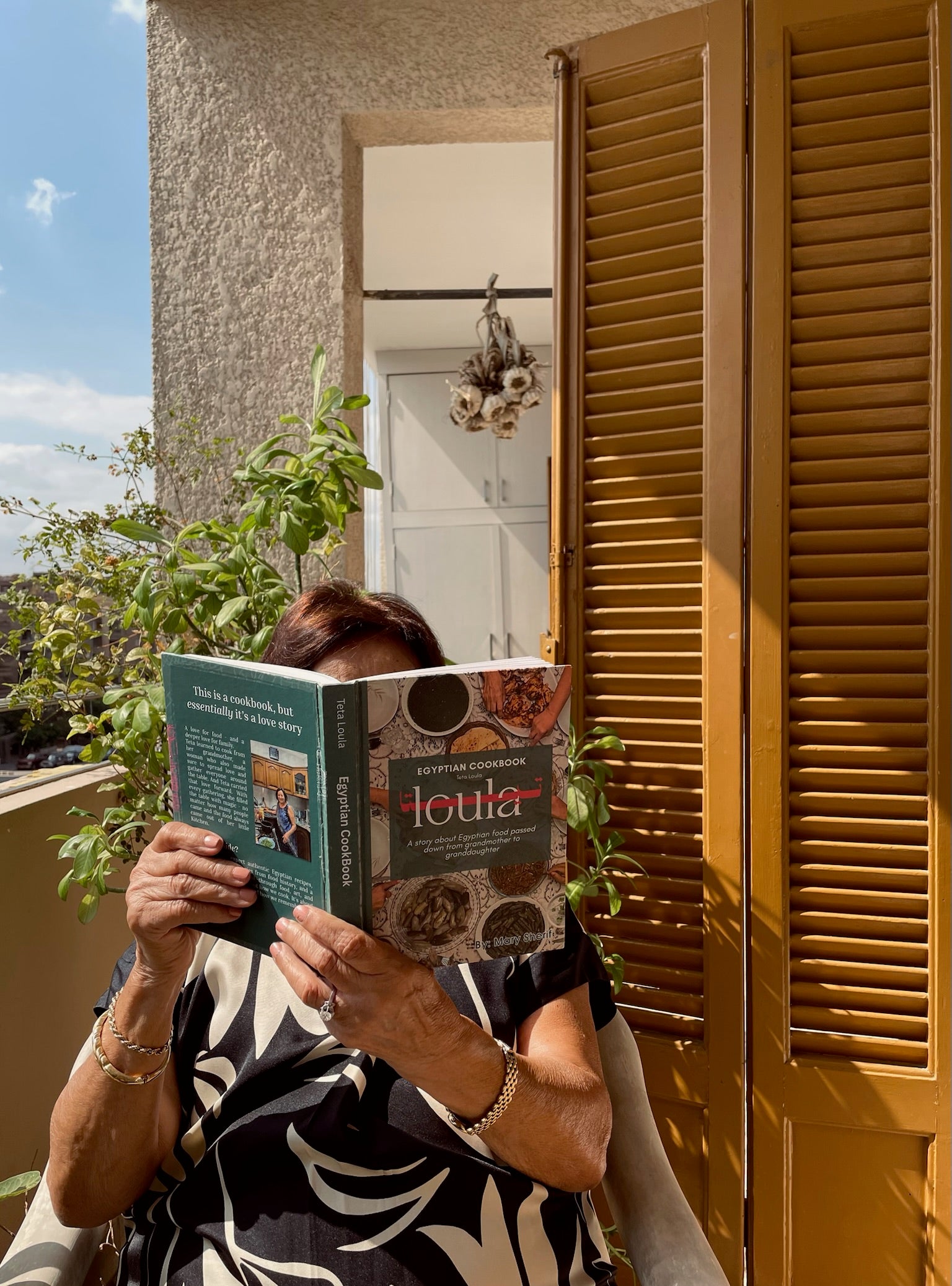 Teta Loula's Egyptian Kitchen cookbook, hardcover, on a table